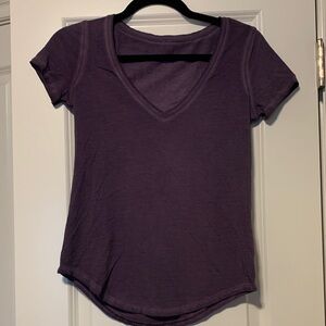 Lululemon Washed Purple Ink V-Neck T-Shirt
Size 0, Excellent Condition